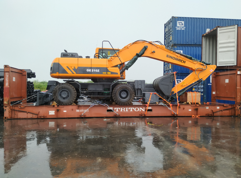 SINOMACH OE 210Z excavator securely loaded on open top container with proper lashing and weather protection