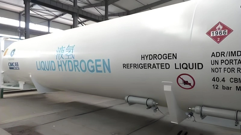 Large white cryogenic tank container labeled "LIQUID HYDROGEN" and "HYDROGEN REFRIGERATED LIQUID", featuring hazard placard 1966, manufactured by CIMC Enric for high-purity hydrogen transport