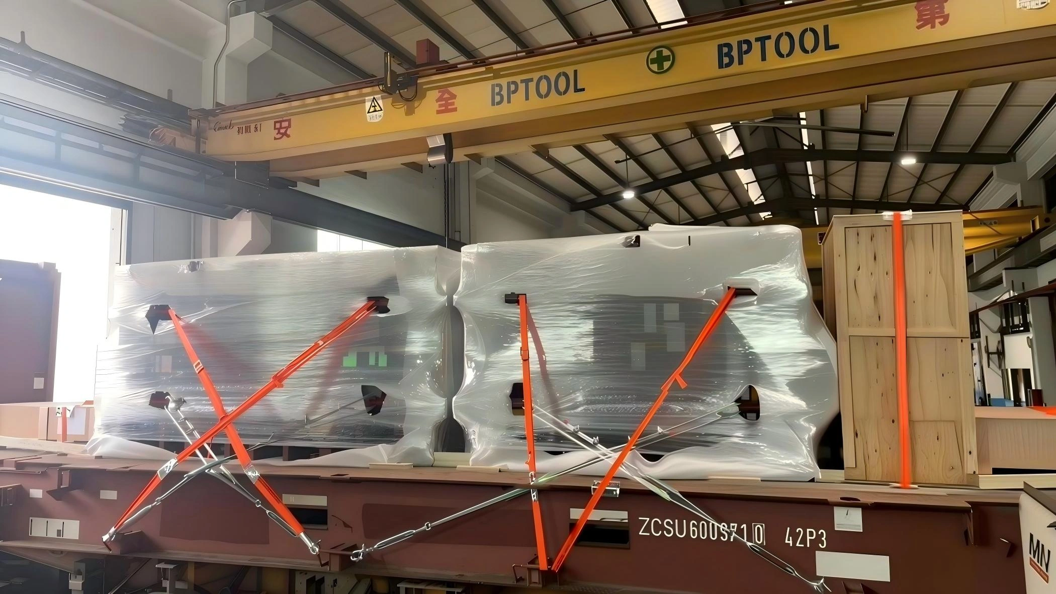 Bentlee logistics team conducting on-site cargo measurement and assessment of heavy industrial machinery for factory relocation.