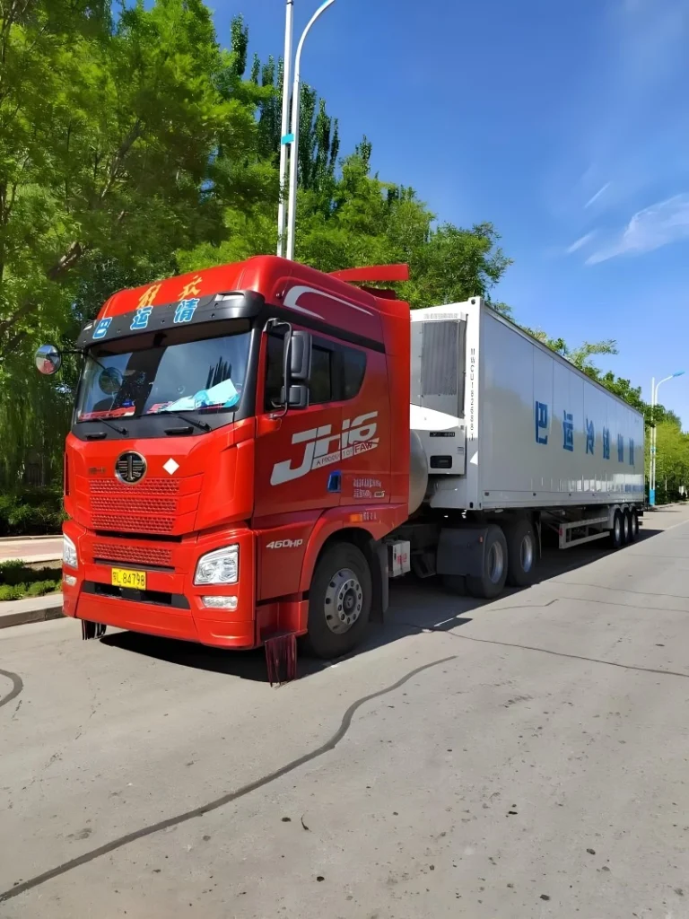 Refrigerated truck transporting temperature-sensitive cargo with advanced cold chain management and real-time monitoring